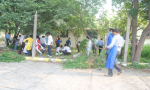 Parisar ki safai kerte hue Adhikari and other employee